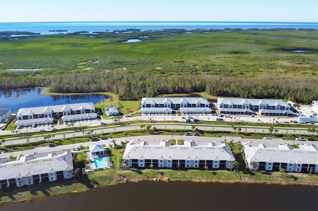 drone / aerial view with a water view