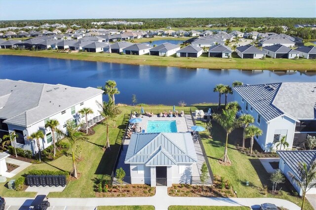 drone / aerial view with a water view