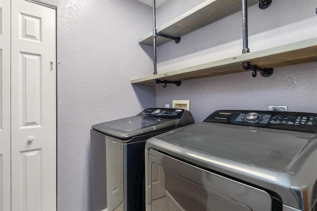 washroom featuring separate washer and dryer