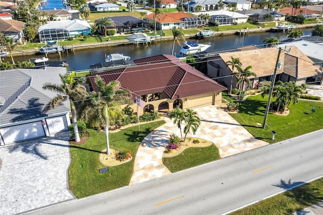 bird's eye view with a water view