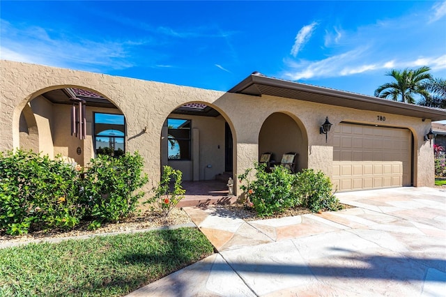 view of front of property featuring a garage