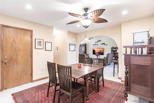 dining space featuring ceiling fan