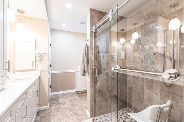 bathroom featuring vanity and walk in shower