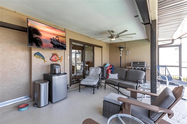 view of patio / terrace featuring outdoor lounge area and ceiling fan