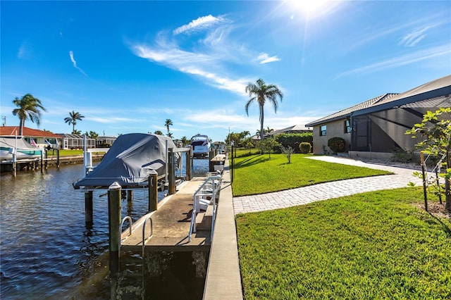 view of dock featuring glass enclosure, a yard, and a water view