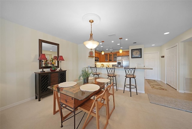 view of carpeted dining room