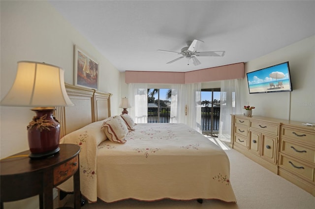 bedroom featuring ceiling fan and access to outside