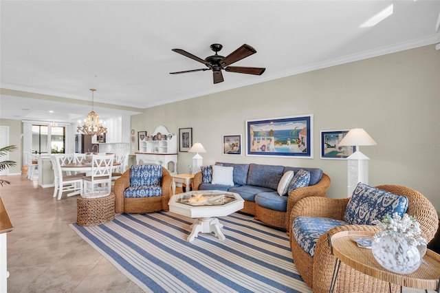 tiled living room with ceiling fan with notable chandelier and ornamental molding