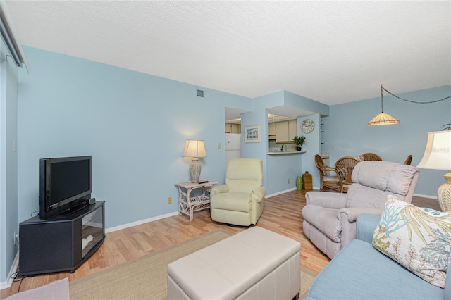 living room featuring hardwood / wood-style flooring