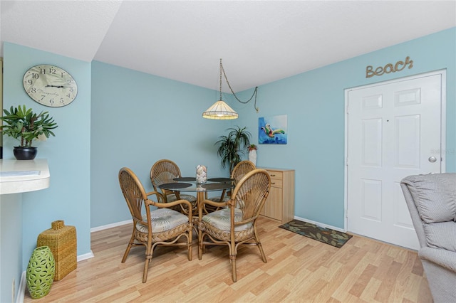 dining area featuring hardwood / wood-style flooring