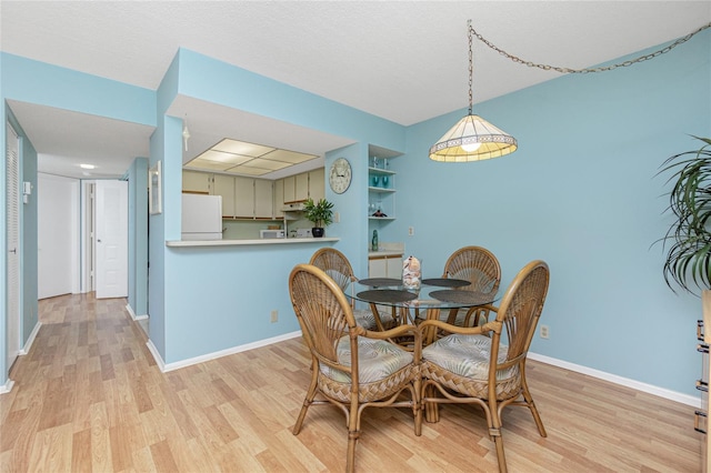 dining area featuring light hardwood / wood-style flooring