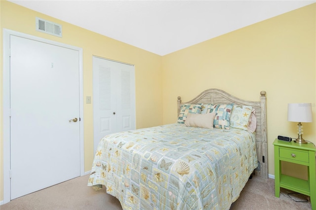 carpeted bedroom featuring a closet