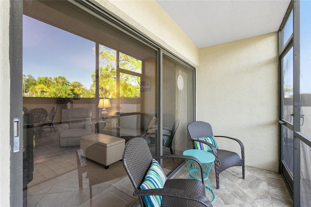 sunroom featuring a healthy amount of sunlight