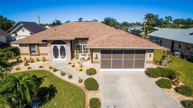 ranch-style home featuring a front yard