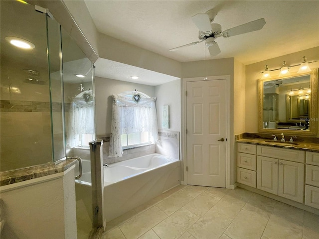 bathroom featuring separate shower and tub, ceiling fan, tile patterned floors, and vanity