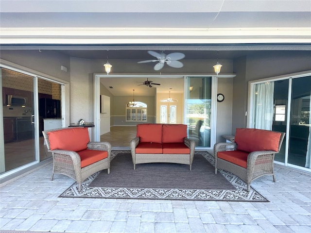 view of patio featuring ceiling fan