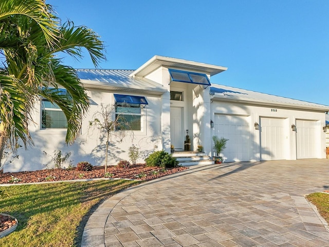 view of front of home featuring a garage