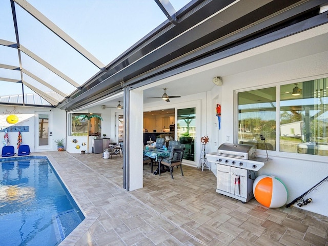 view of patio / terrace featuring glass enclosure and a grill