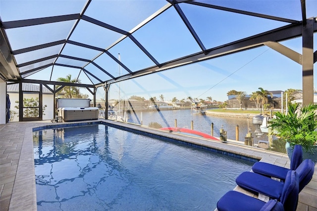 outdoor pool featuring a lanai, a dock, and a patio