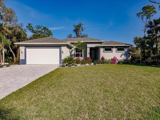 single story home with a front lawn and a garage