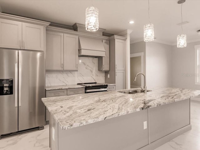 kitchen with sink, custom range hood, stainless steel appliances, and an island with sink