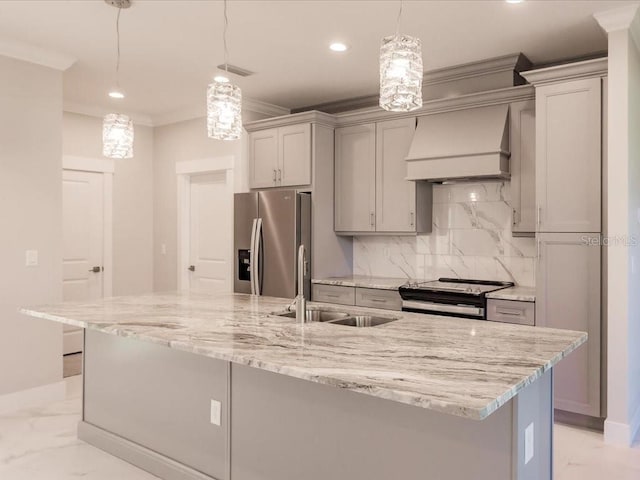 kitchen featuring backsplash, hanging light fixtures, custom range hood, and appliances with stainless steel finishes