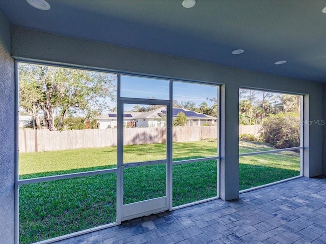 view of unfurnished sunroom