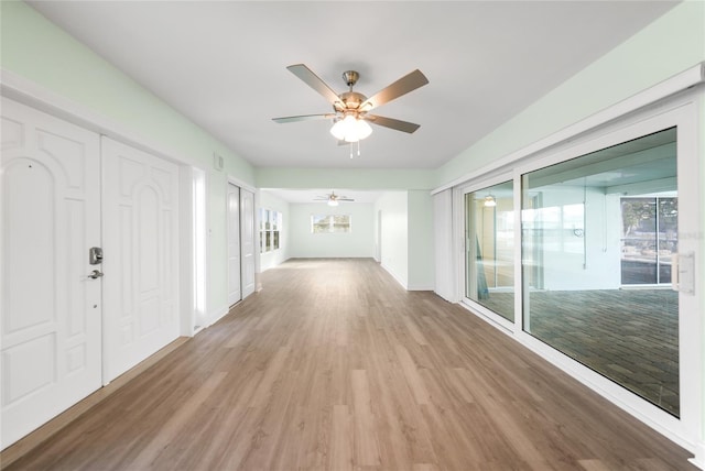 hall featuring light wood-type flooring