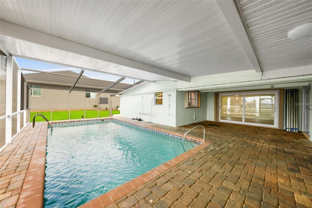 view of pool featuring a patio area and a lanai