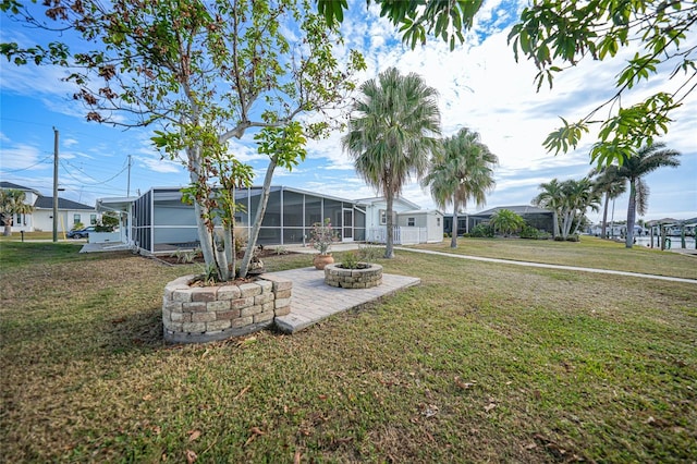 view of yard with a fire pit