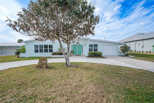 ranch-style house with a front yard and a garage