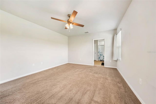 unfurnished room featuring carpet and ceiling fan