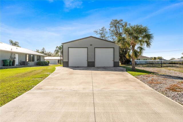 garage with a yard