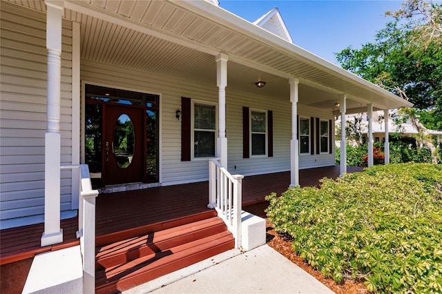 doorway to property featuring covered porch