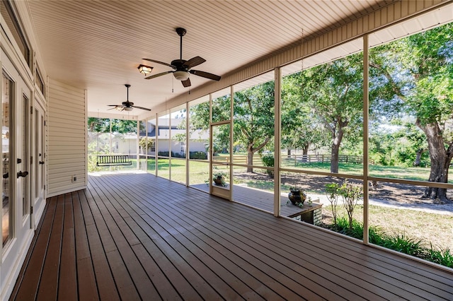 wooden deck with ceiling fan