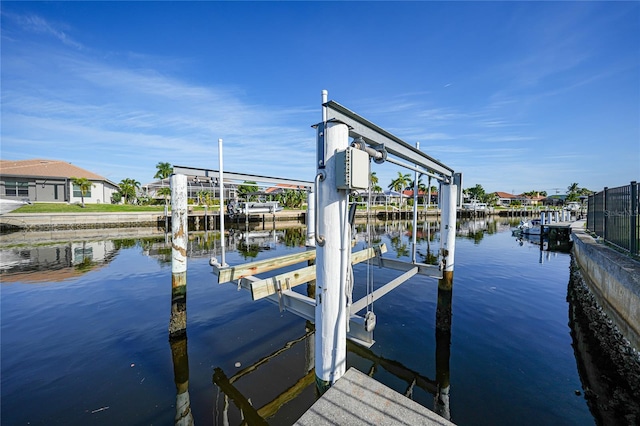 dock area featuring a water view