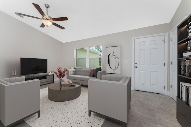 living room with ceiling fan and lofted ceiling