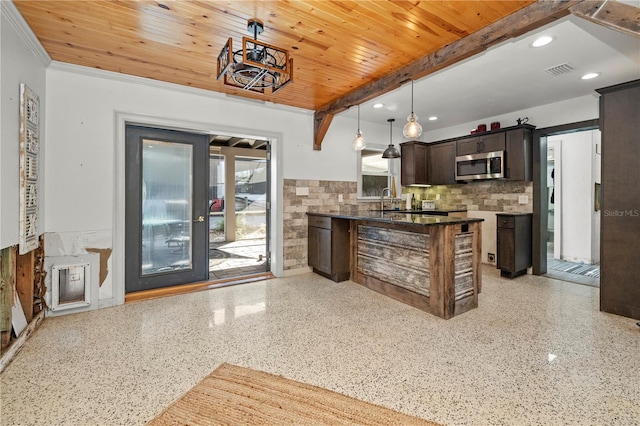 kitchen with kitchen peninsula, dark brown cabinets, wooden ceiling, beamed ceiling, and hanging light fixtures