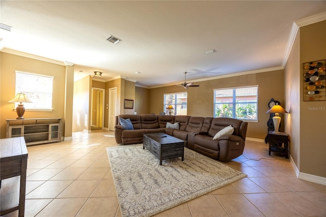 living room featuring ceiling fan, light tile patterned flooring, and ornamental molding