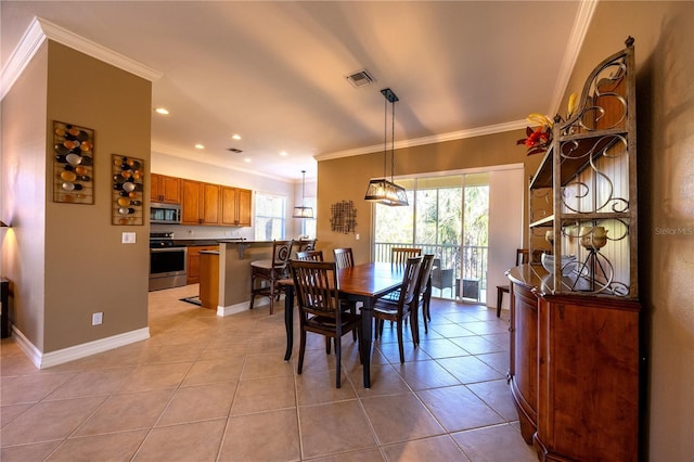 tiled dining area with ornamental molding