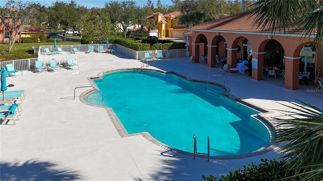 view of pool featuring a patio area