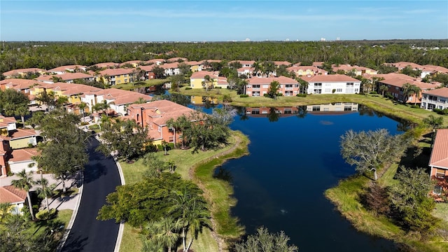 drone / aerial view featuring a water view