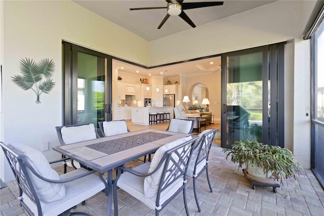 view of patio with ceiling fan