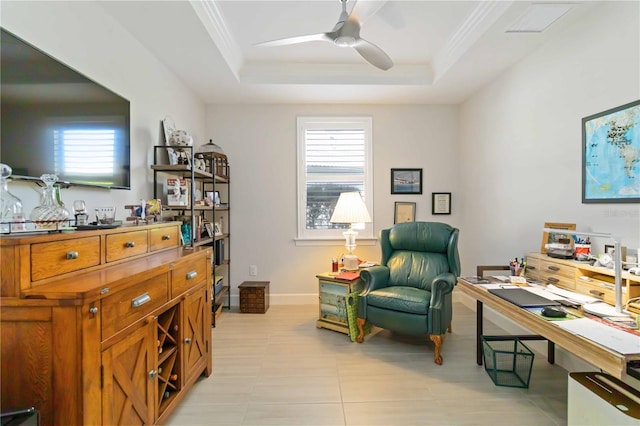 tiled office with a raised ceiling, ceiling fan, and crown molding