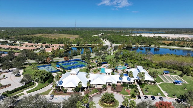 birds eye view of property with a water view