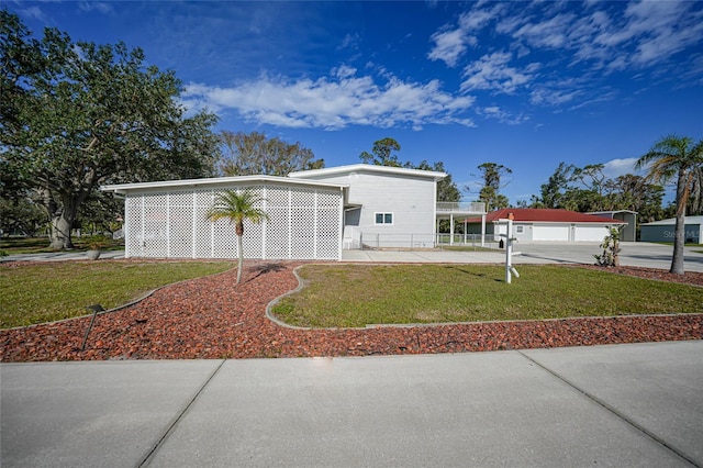 view of front of home with a front yard