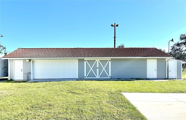 view of outdoor structure with a yard