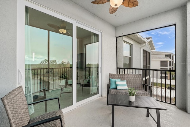 balcony featuring ceiling fan