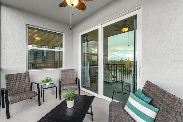 balcony featuring ceiling fan