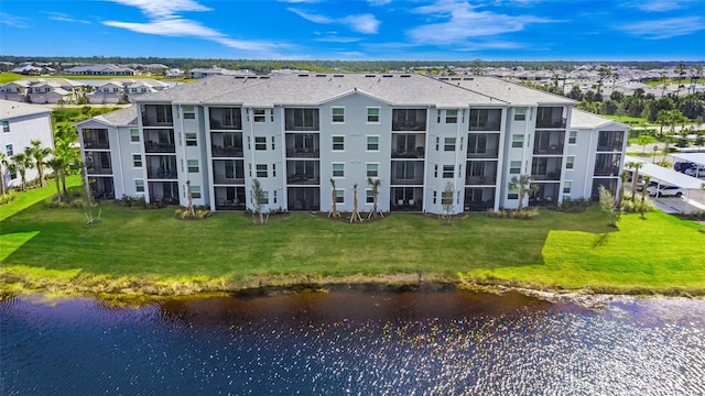 view of building exterior featuring a water view